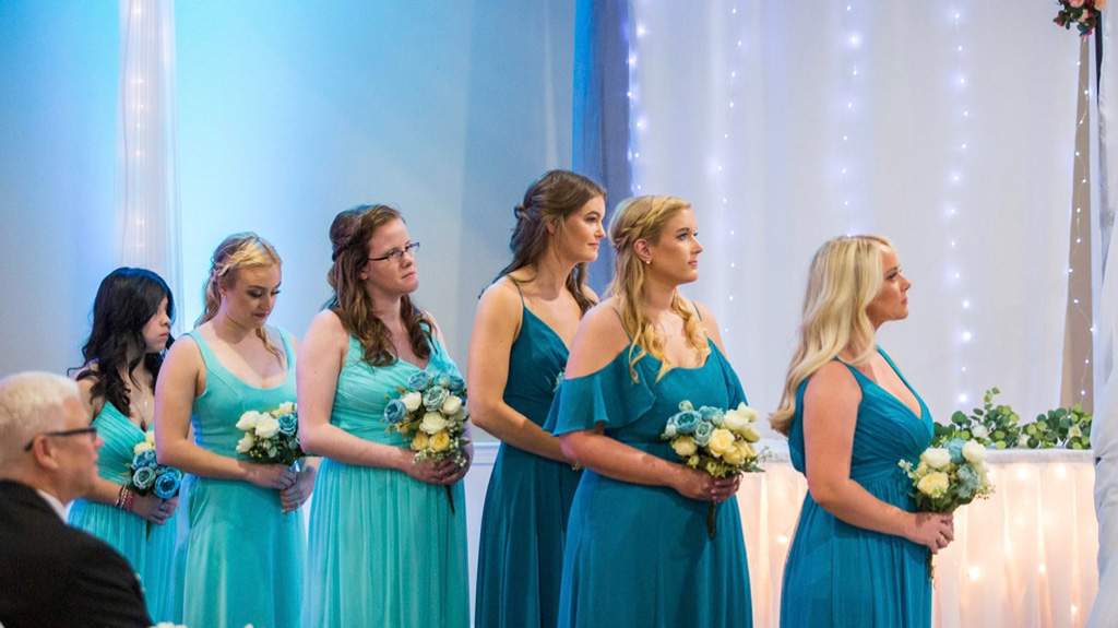 Bridesmaids standing in a wedding ceremony