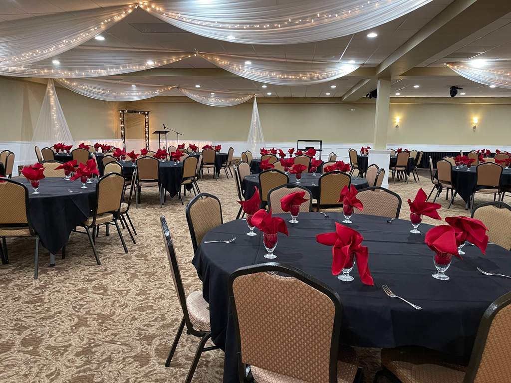 Reception venue with round tables and chairs