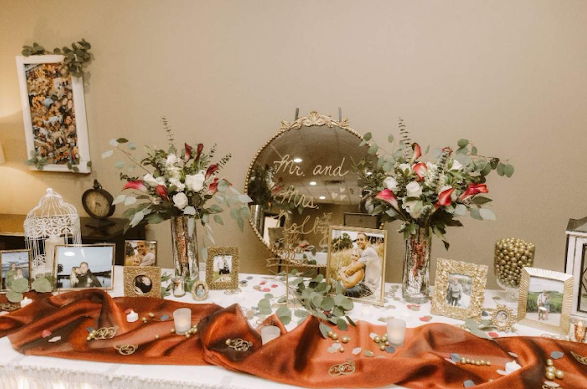 Table Setup With Pictures at a wedding